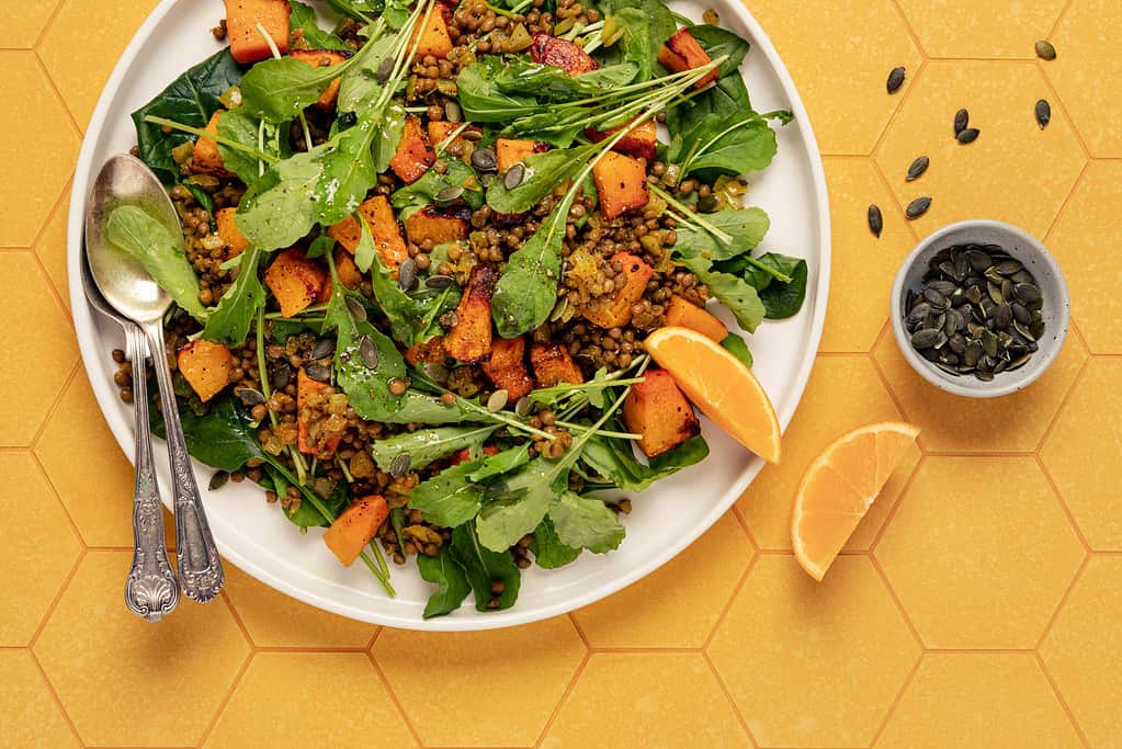 Spinach and rocket with curried lentils and pumpkin