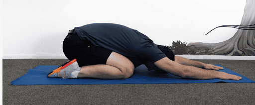 Quad stretch “baby yoga pose”