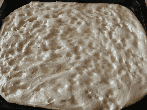 Place the dough into a tray