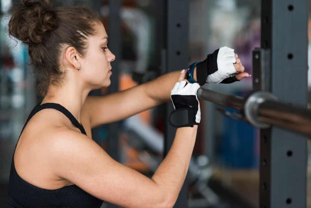 Woman using a barbell