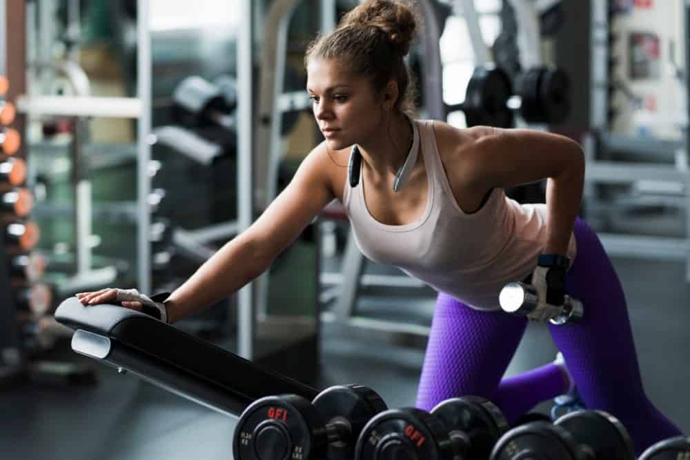 Woman using a dumbell