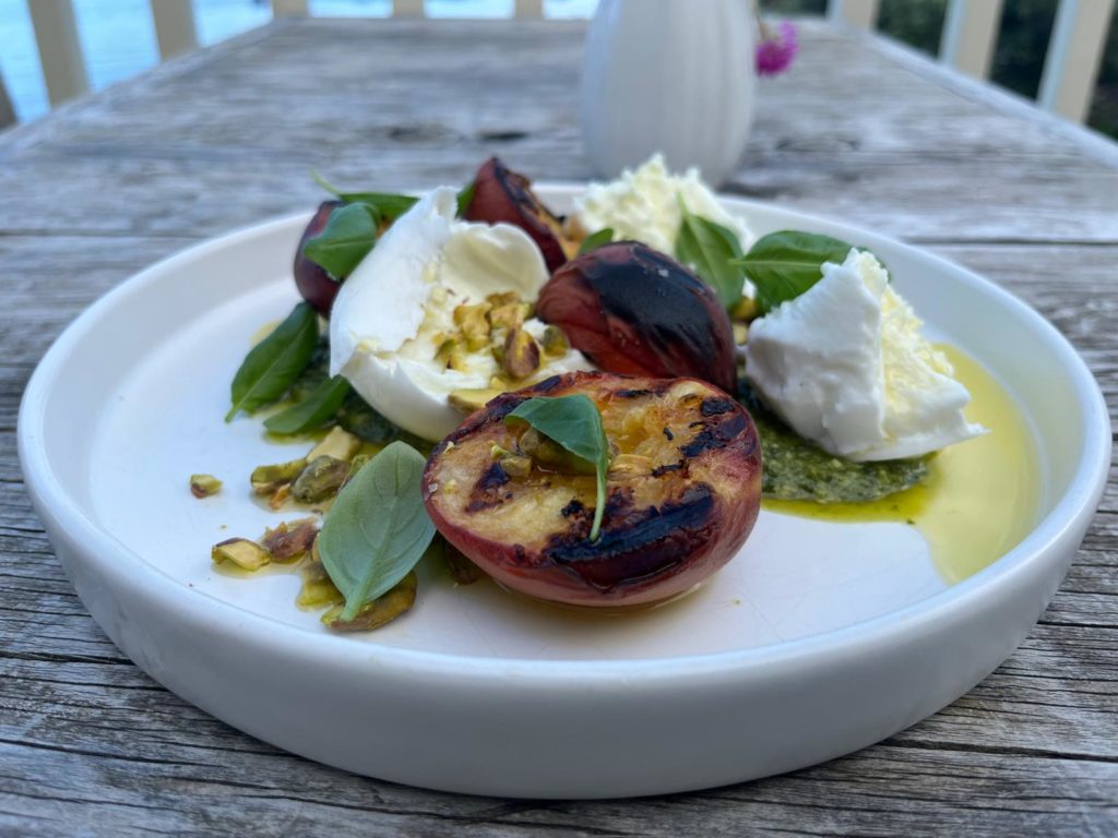 Grilled peaches with buffalo mozzarella and pistachio pesto- main