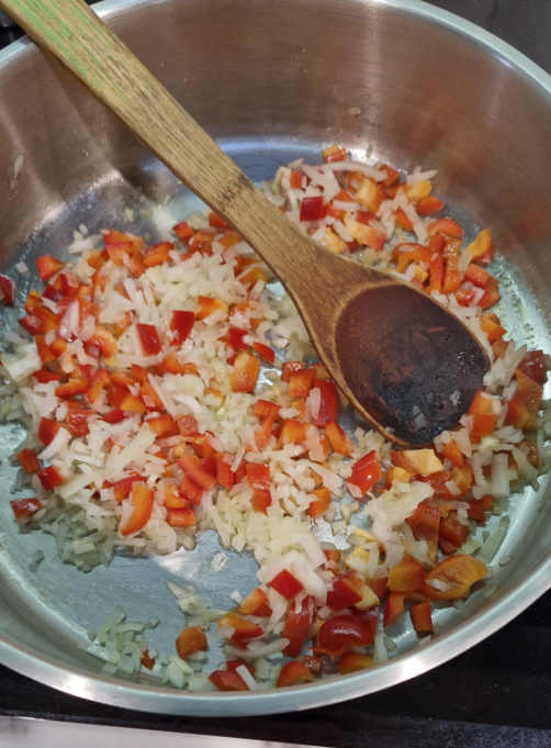 sauté the onion, tomatoes and capsicums