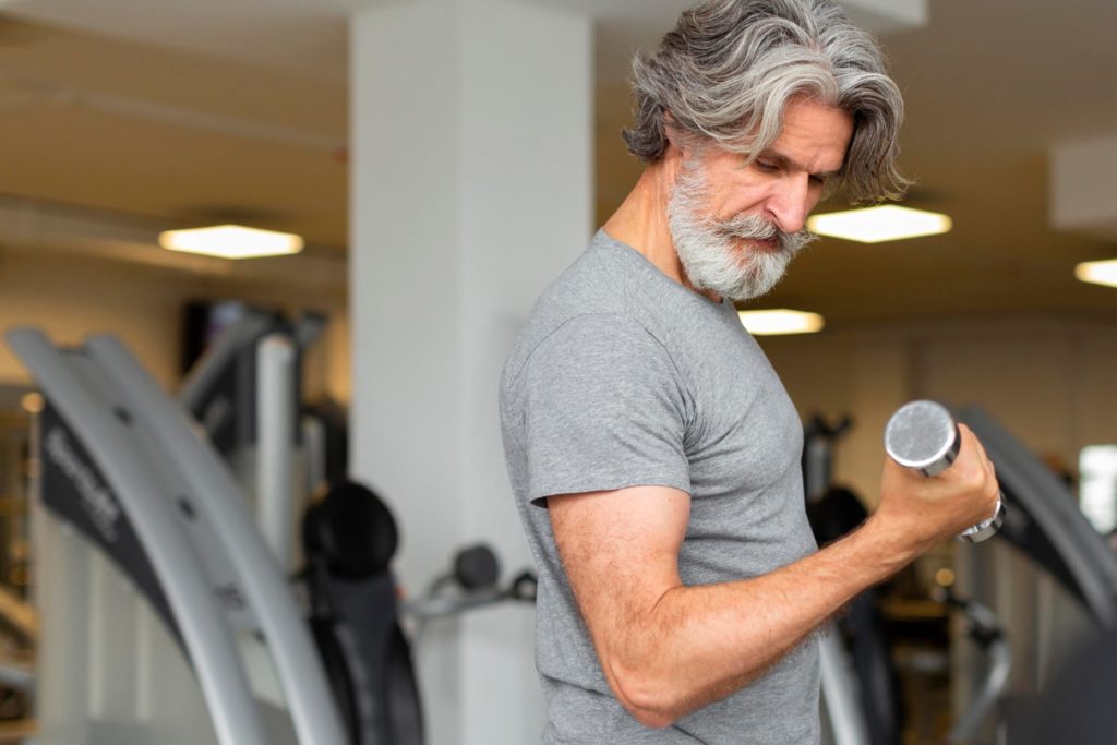 Man-in-his-50s-doing-bicep-curls-1